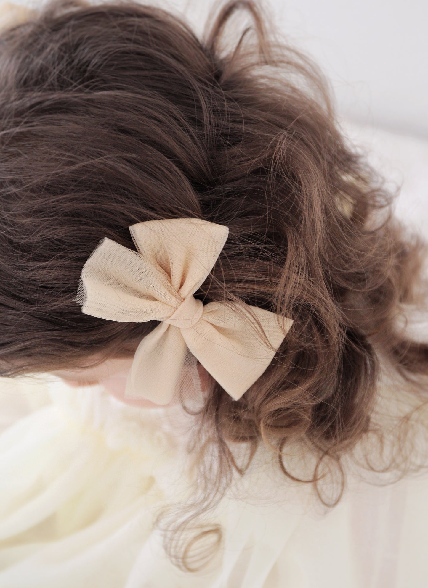 Beige tulle bow