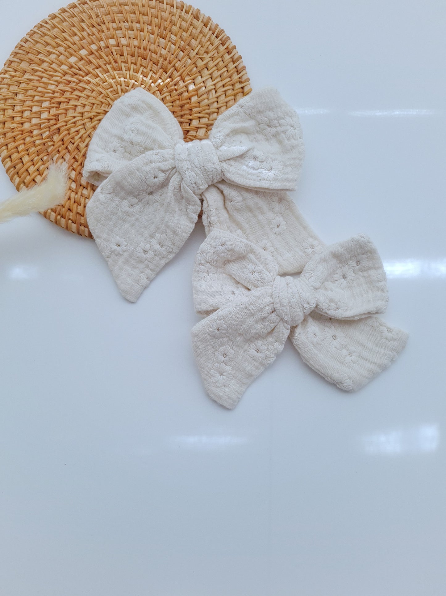 Embroidered ecru bow